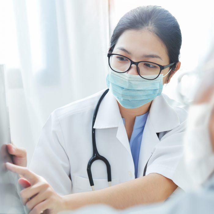Women doctor and patient