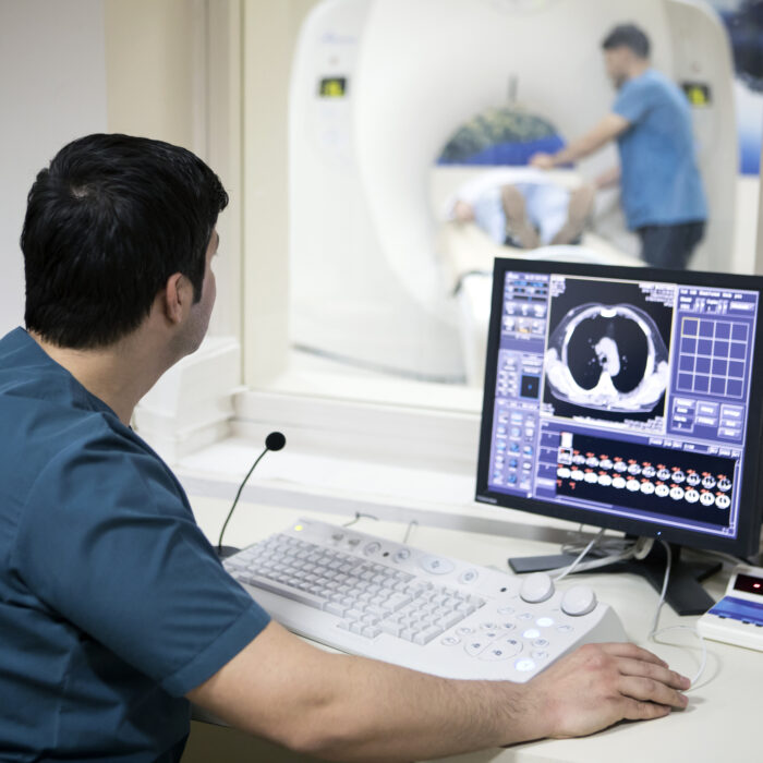 Radiologist reading a CAT scan