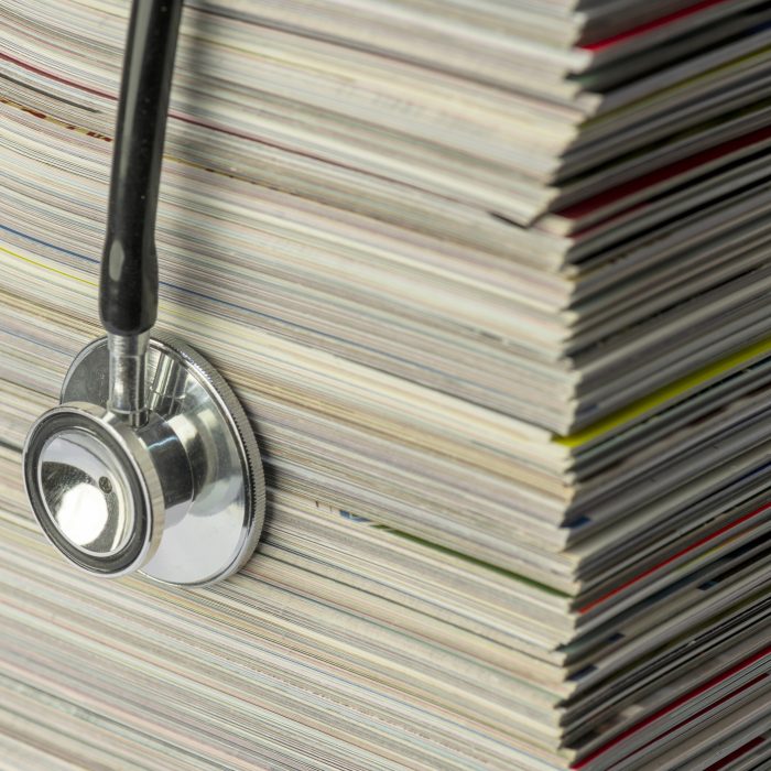 medical journals and stethoscope