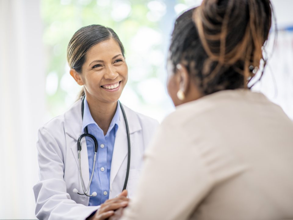 Older woman in medical consultation with her doctor