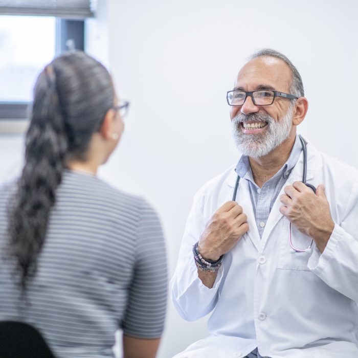 Male Doctor Meets With Female Patient