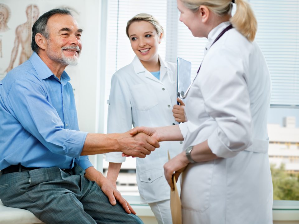 senior couple visiting a doctor
