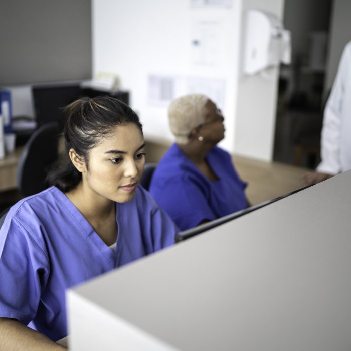 Secretary working at hospital reception
