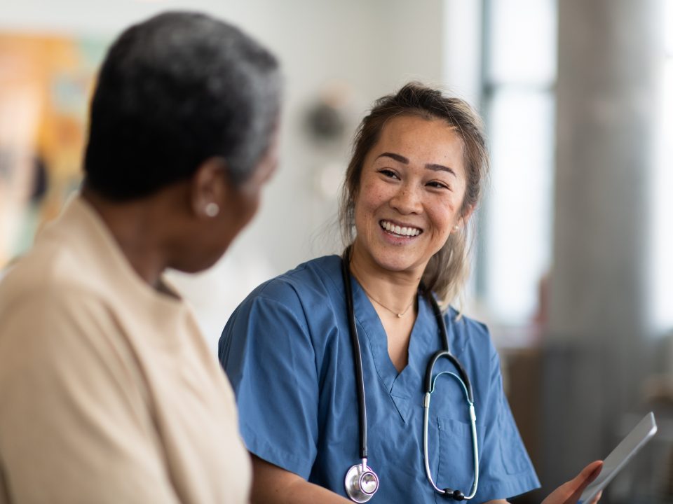 Nurse and patient having a conversation