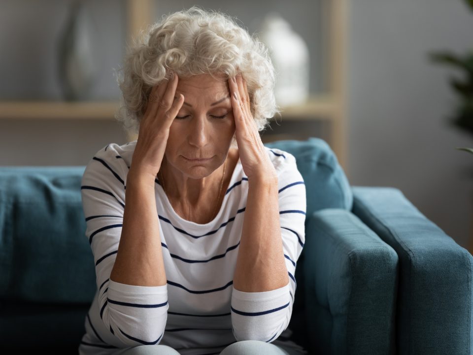 Senior woman feeling dizzy