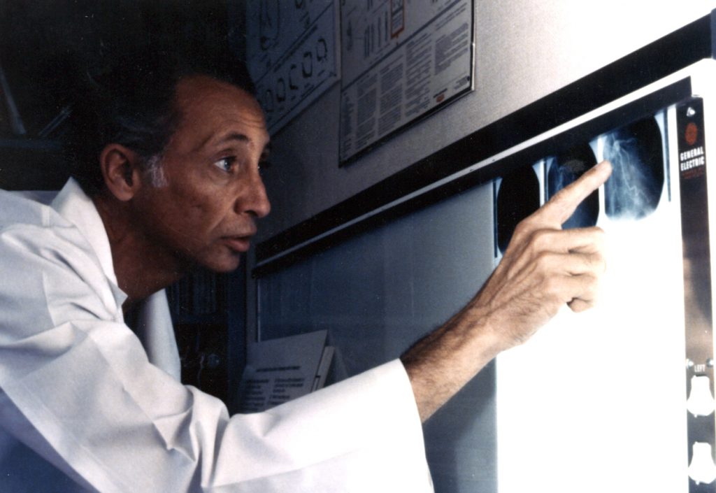 Dr. Mara looking at x-ray