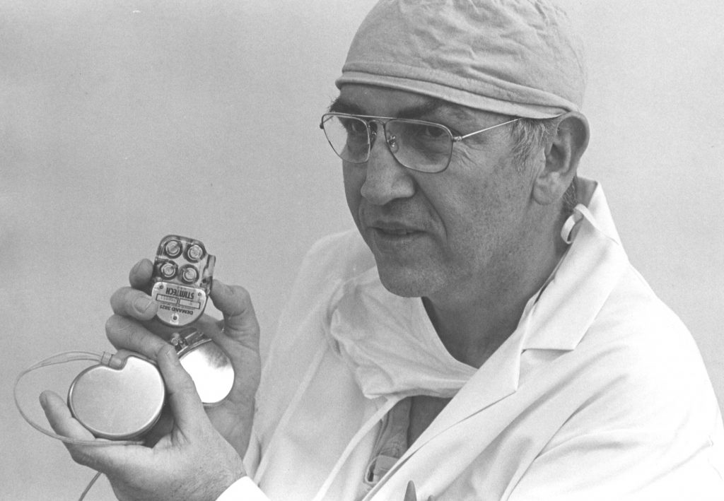 Dr. Morse holding pace maker
