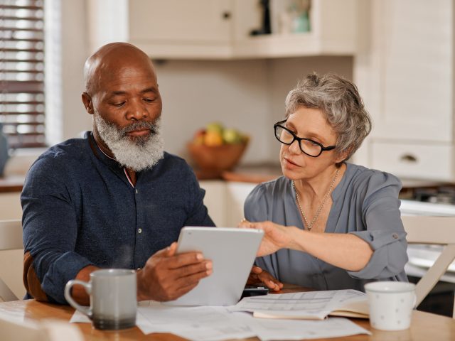 Couple using tablet