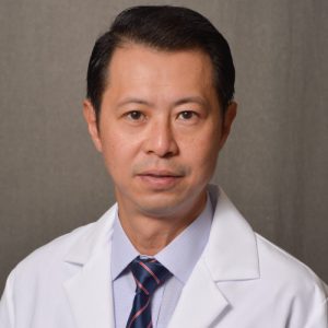 male physician in white lab coat